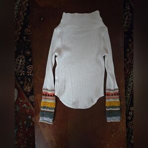 Cozy White Turtleneck Sweater with Colorful Knit Sleeves Sleeves